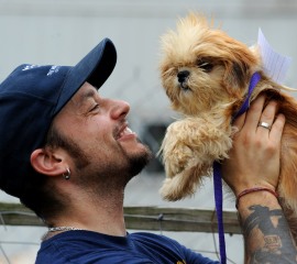 Adam Parascandola of The HSUS holds one of the rescued dogs