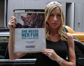 Heather Mills with HSUS fur-free poster