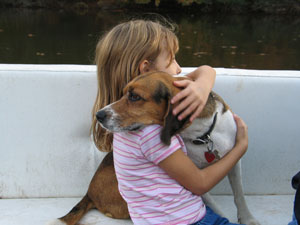 Little girl and beagle