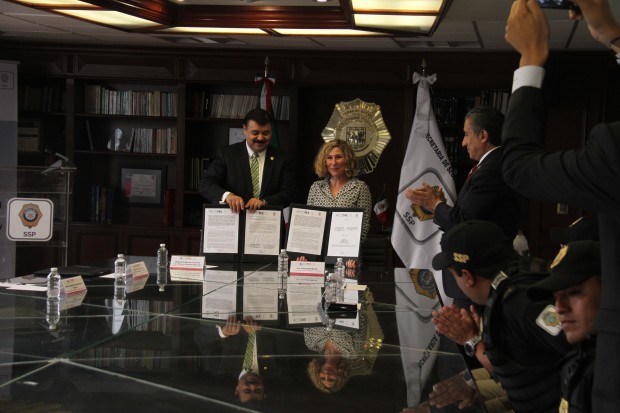 HSI Vice President Kitty Block with Mexico City's Minister of Public Security Hiram Almeida, at the signing of the MoU to enforce citywide animal cruelty laws.